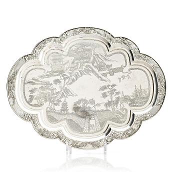 1264. A lobed silver tray on four feet, Shanghai, Singfat, China Trade.