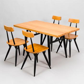 ILMARI TAPIOVAARA, A "Pirkka" table and four chairs manufactured by Laukaan Puu and designed in 1957.