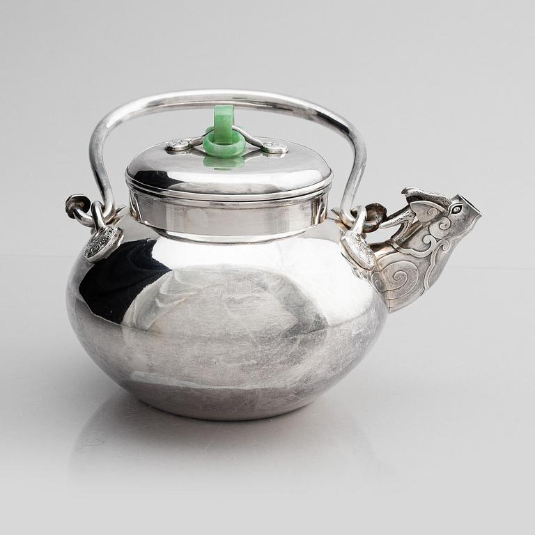 A silver tea pot with cover, Japan, early 20th century.