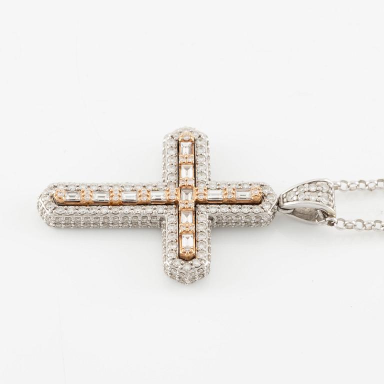 Necklace, 18K white gold in the form of a cross, set with baguette and brilliant-cut diamonds.