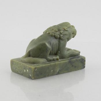 A Chinese stone figure of a lion, 20th century.