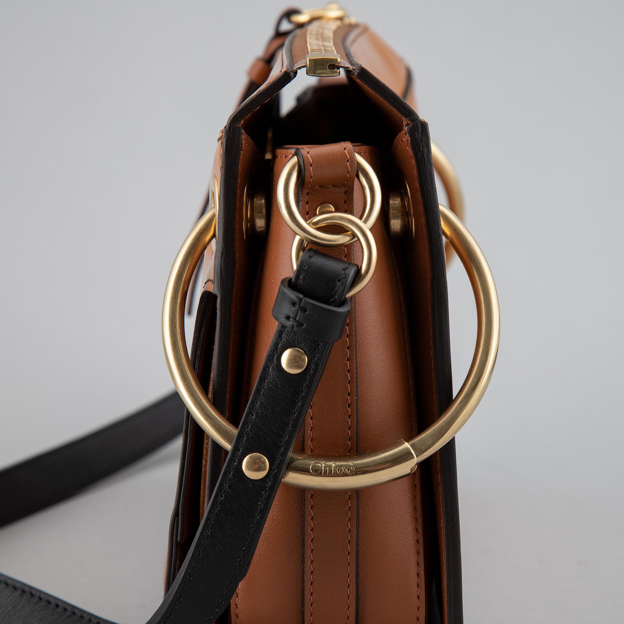 CHLOÉ, a small caramel 'Roy bag'.