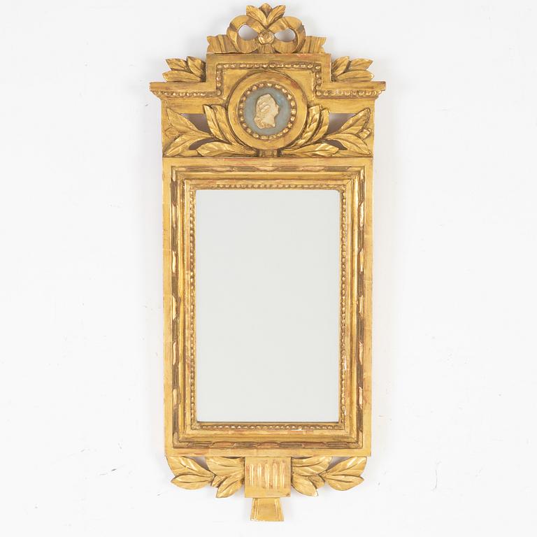 A Gustavian style mirror by John Lundmark, 20th Century.
