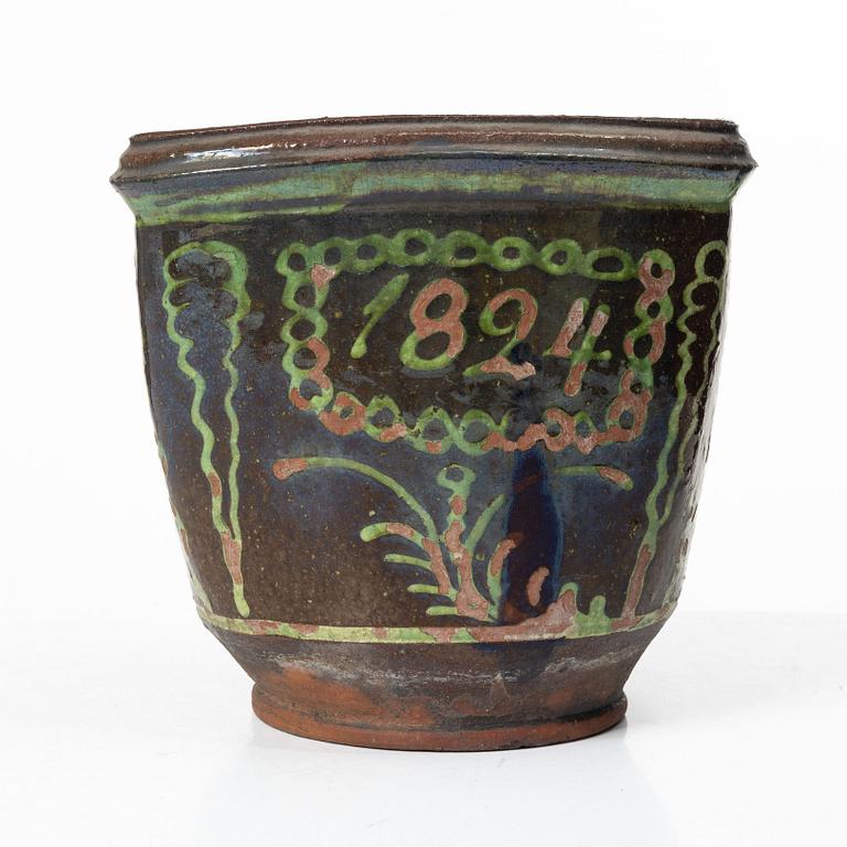 Stoneware planter and stand, dated 1824.