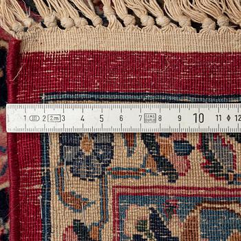 A semi-antique Kerman carpet, of Safavid 'vase' design, ca 484 x 291 cm.