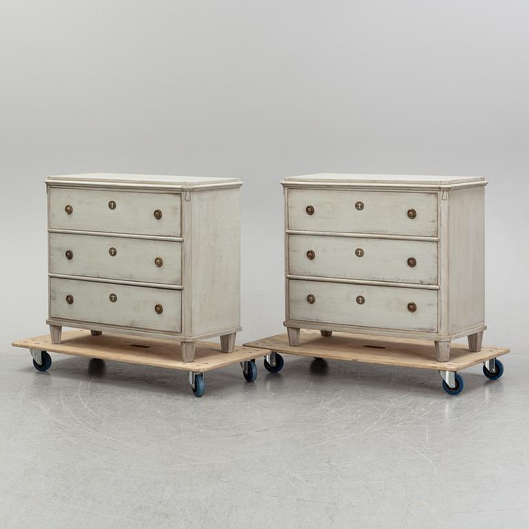A pair of painted late gustavian-style chest of drawers.
