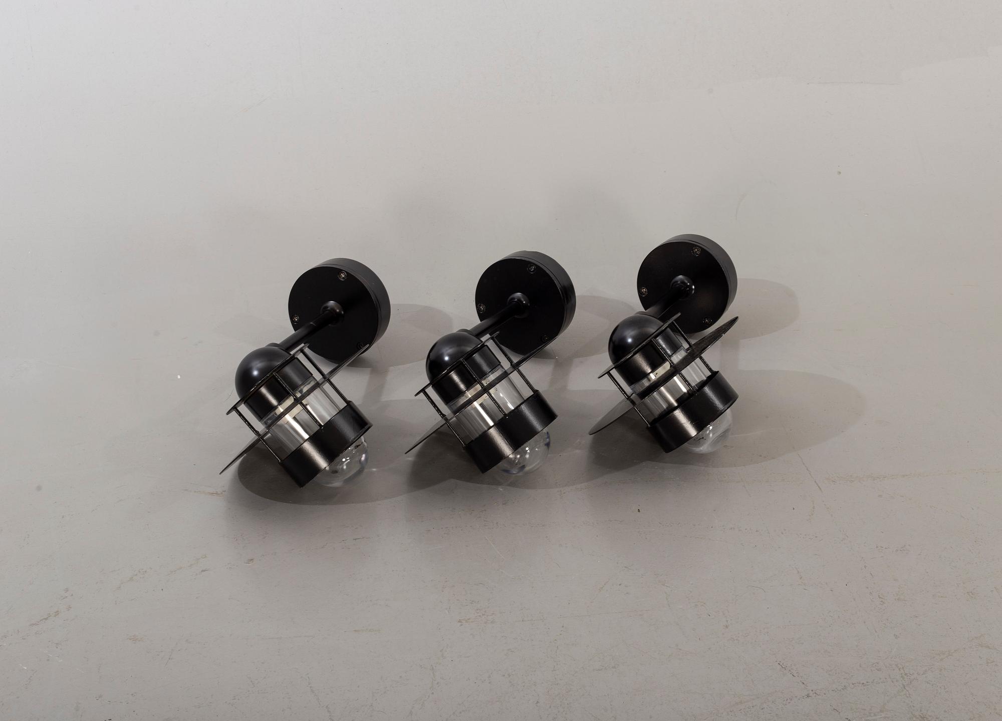 JENS MØLLER-JENSEN, three wall lamps for out doors, "Albertslund", Louis Poulsen.