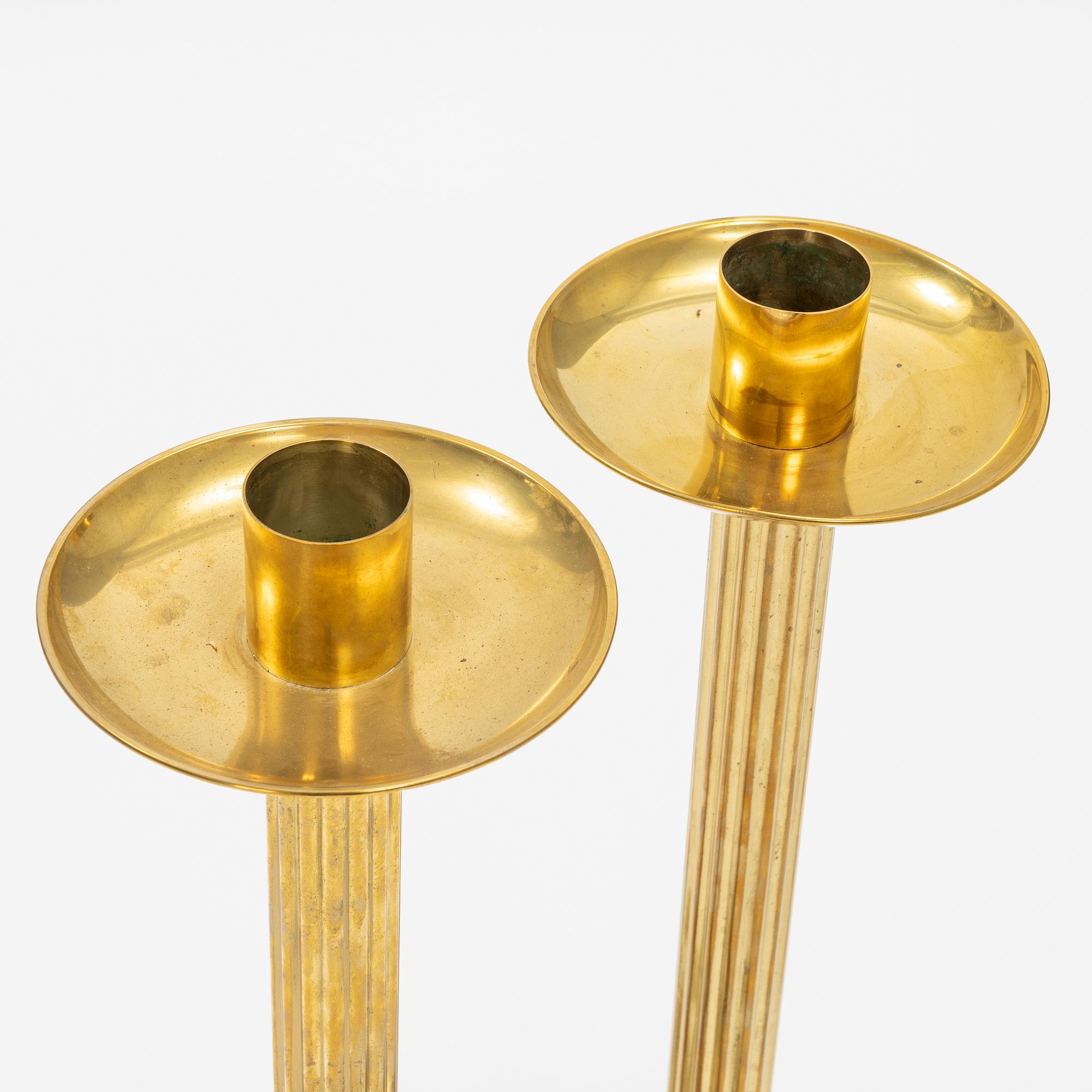 Ivar Ålenius-Björk, a pair of brass candle holders, Ystad Metall.