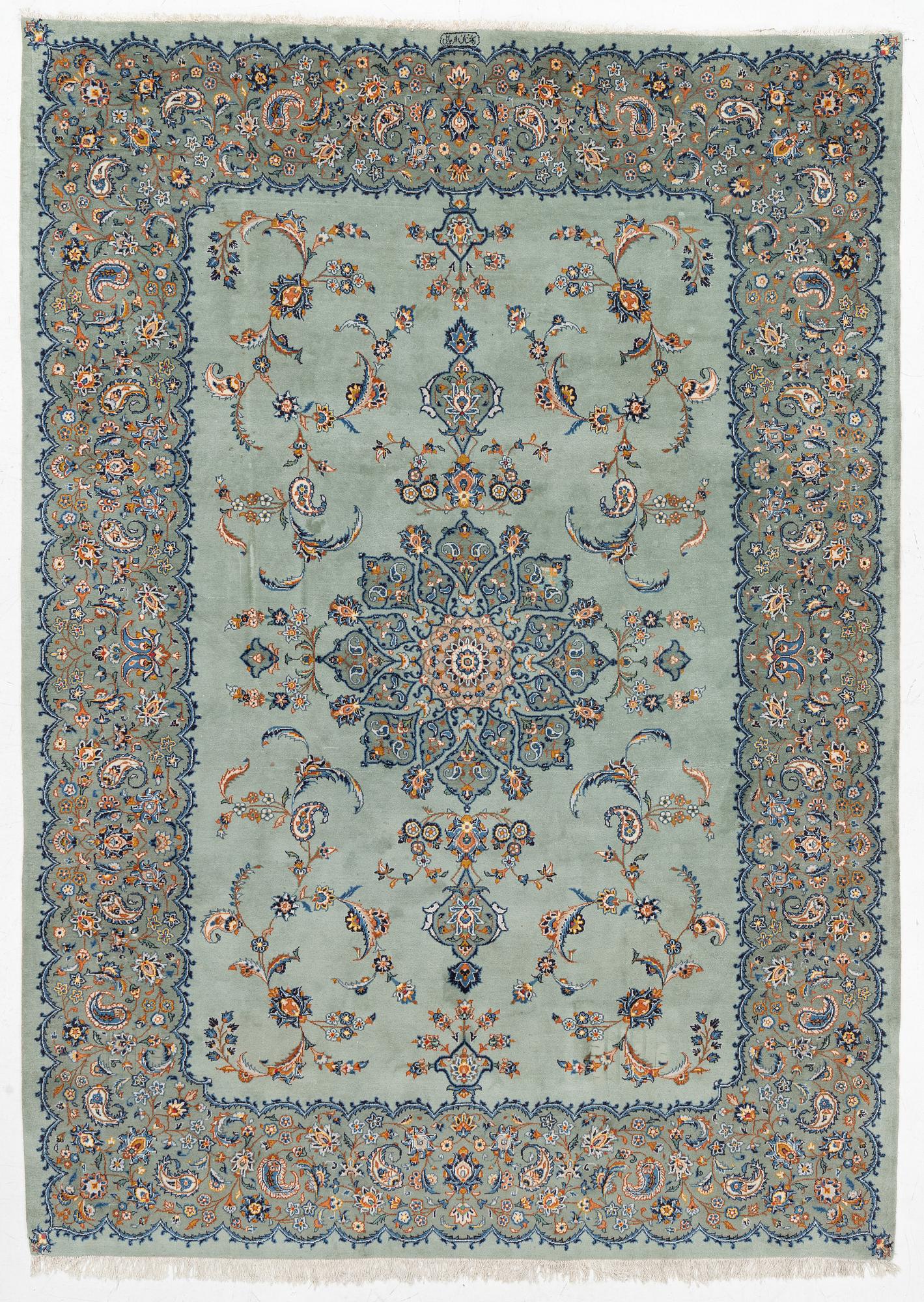 A Keshan carpet, signed, c. 376 x 270 cm.