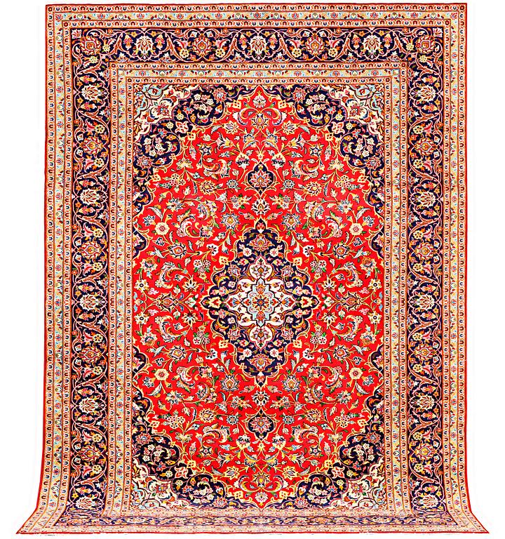 A Kashan carpet, a. 360 x 243 cm.