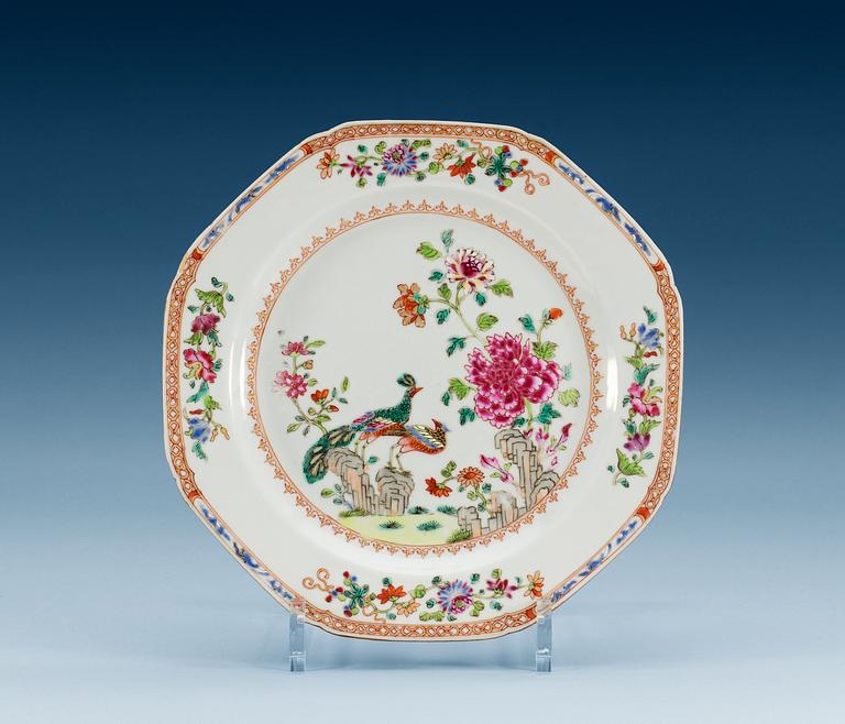 A set of six famille rose 'double peacock' dinner plates, Qing dynasty, Qianlong (1736-95).