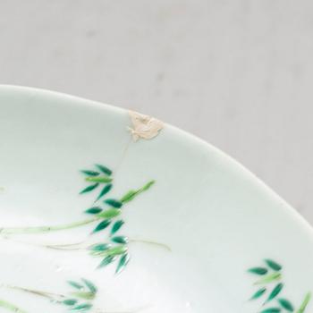 A pair of famille rose plates, late Qing dynasty.