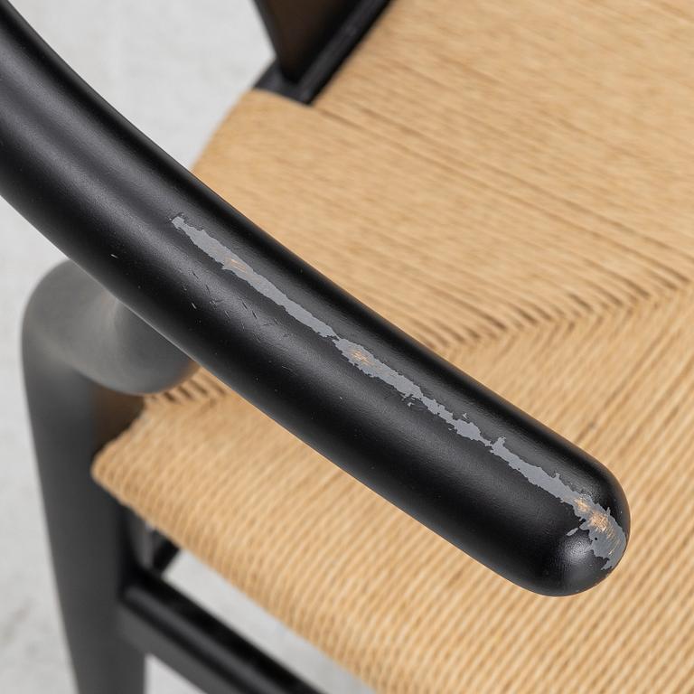 Hans J. Wegner, a model CH-24/'Wishbone' chair, Carl Hansen, Denmark, 21st century.