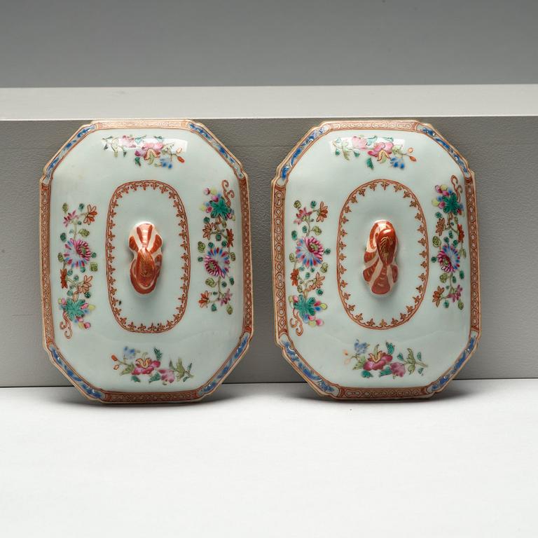 A pair of famille rose 'double peacock' tureens with cover and stands, Qing dynasty, Qianlong (1736-95).