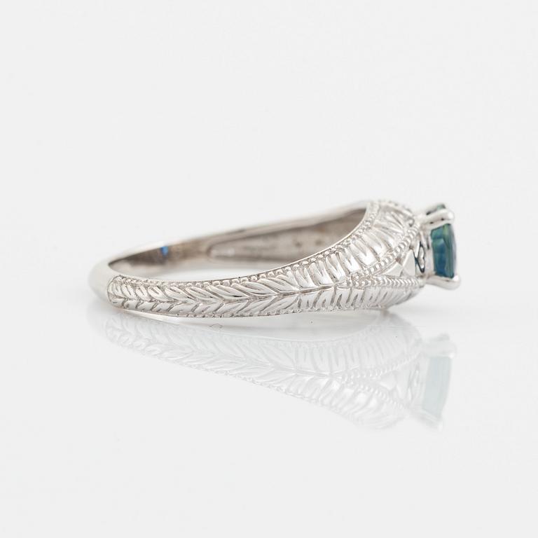 White gold and sapphire ring.