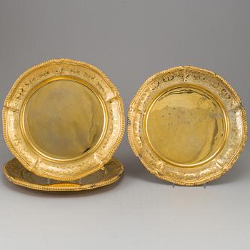 A set of nine silver-gilt sterling plates, Mexico 20th century. Rococo-style.