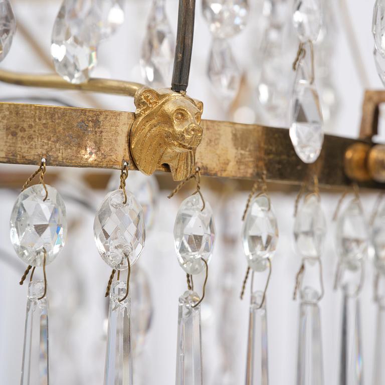 A late Gustavian gilt brass and cut glass eight-branch chandelier, Stockholm, late 18th century.