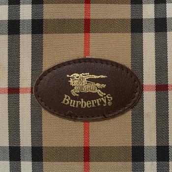 Burberry, a tennis bag.