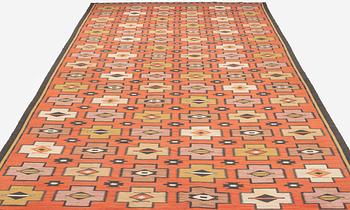 A carpet flat weave, c 607 x 300 cm, possibly Johanna Brunssons Vävskola.