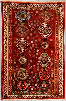 A Kashgai rug, 197 x 127 cm.