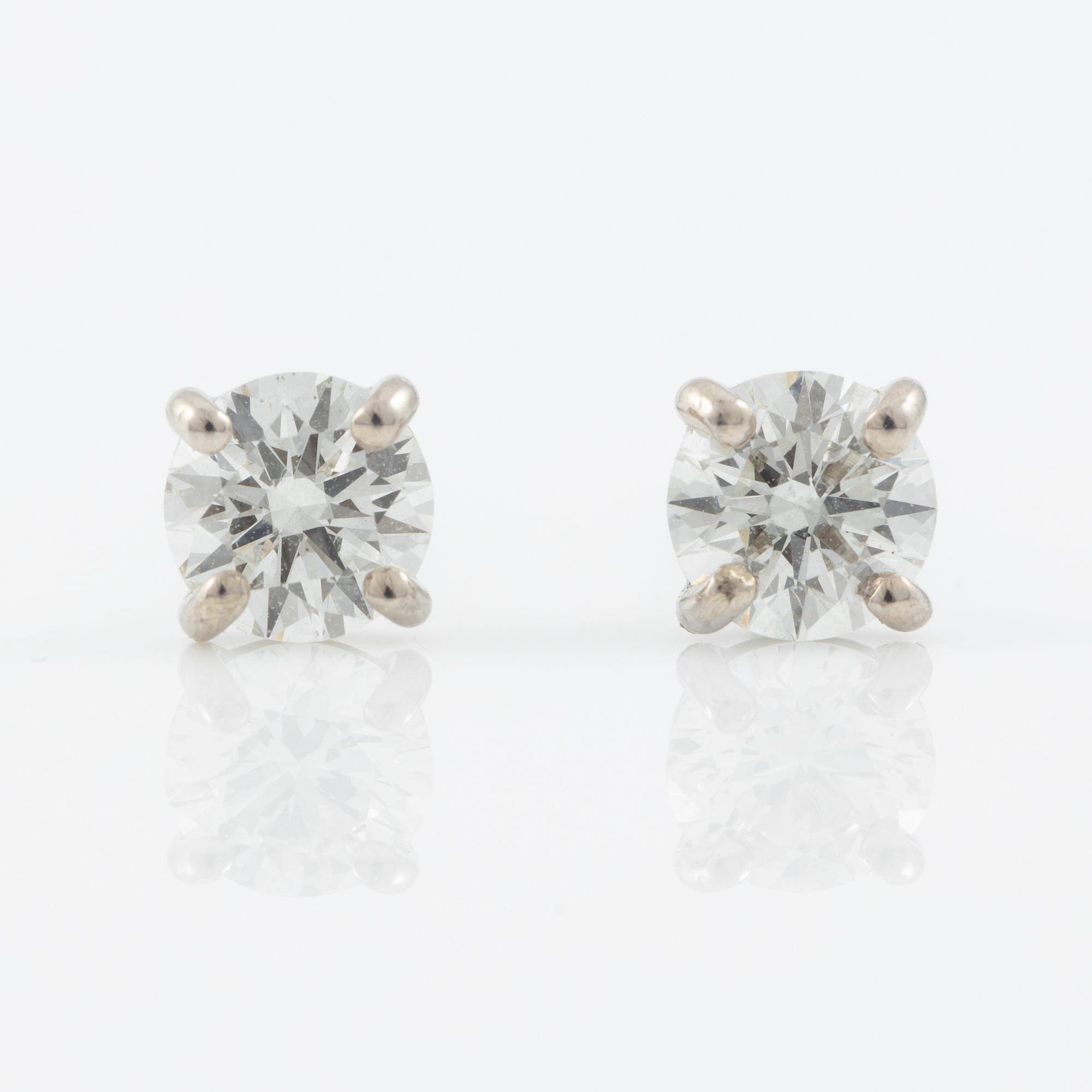 Earrings, 18K white gold with brilliant-cut diamonds.