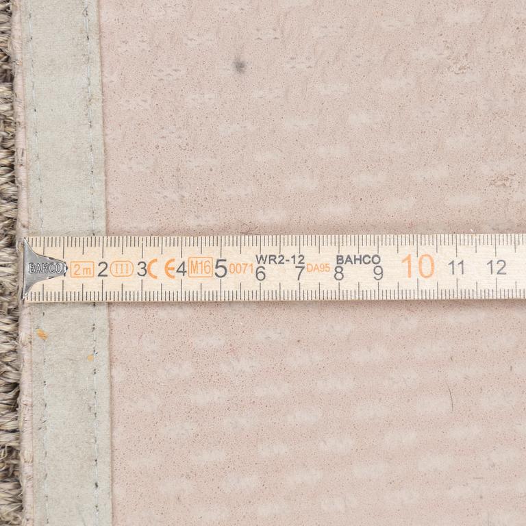 A runner carpet from NTK Atelier, Sweden, c. 448 x 87 cm.