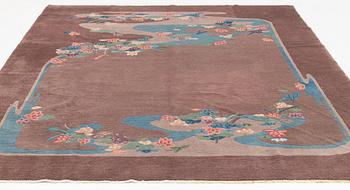 An antique/semi-antique Chinese carpet, c. 292 x 248 cm.