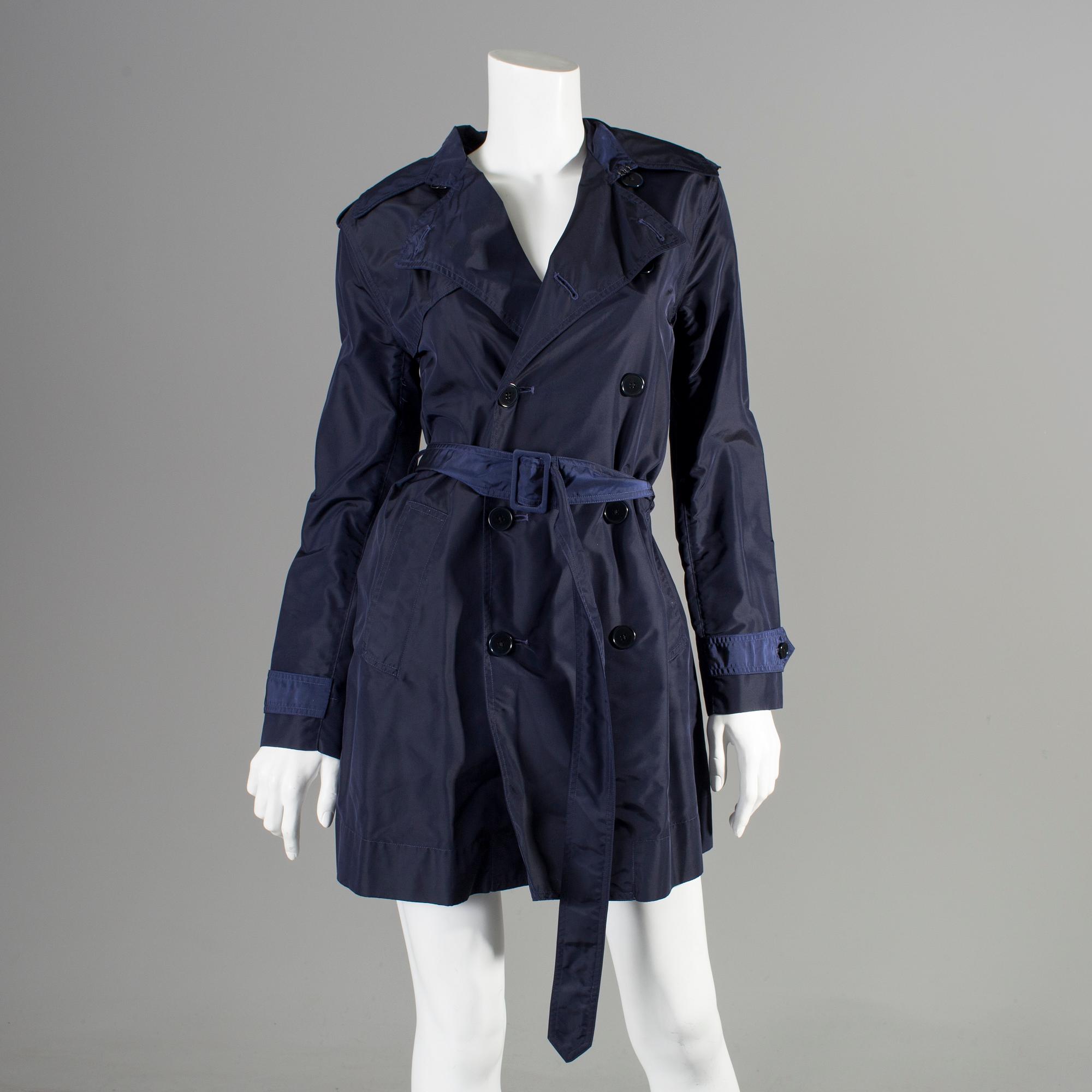 A blue nylon trenchcoat by Ralph Lauren.