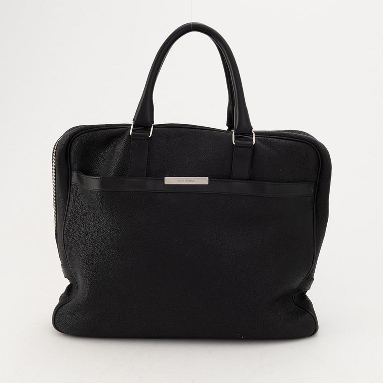 Christian Dior, a black leather briefcase.