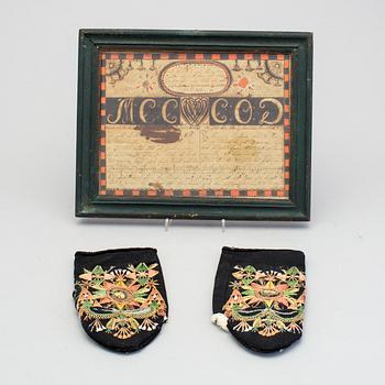 A pair of 19th century folk art brides mittens and a congratulation picture.
