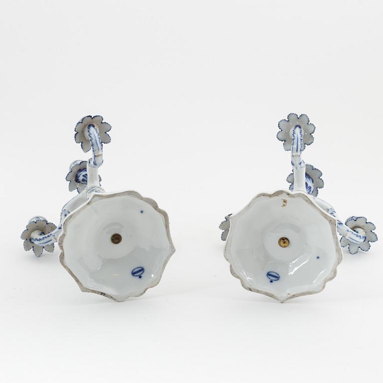 A pair of rococo style porcelain candelabras, Meissen, Germany, early 20th century.