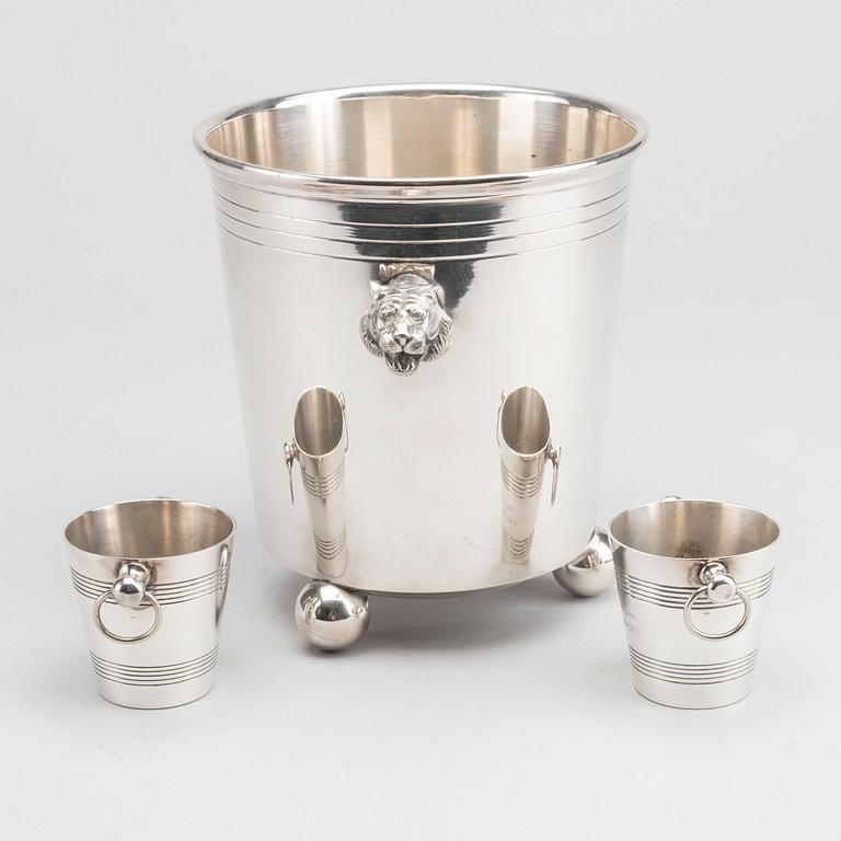 A plated ice bucket and two miniature Bollinger ice buckets. Mid 20th century / latter.