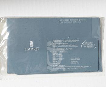 Lladró, figurines, a pair, "Pulcini obelisk enamels left" and "Pulcini obelisk enamels right", Spain.