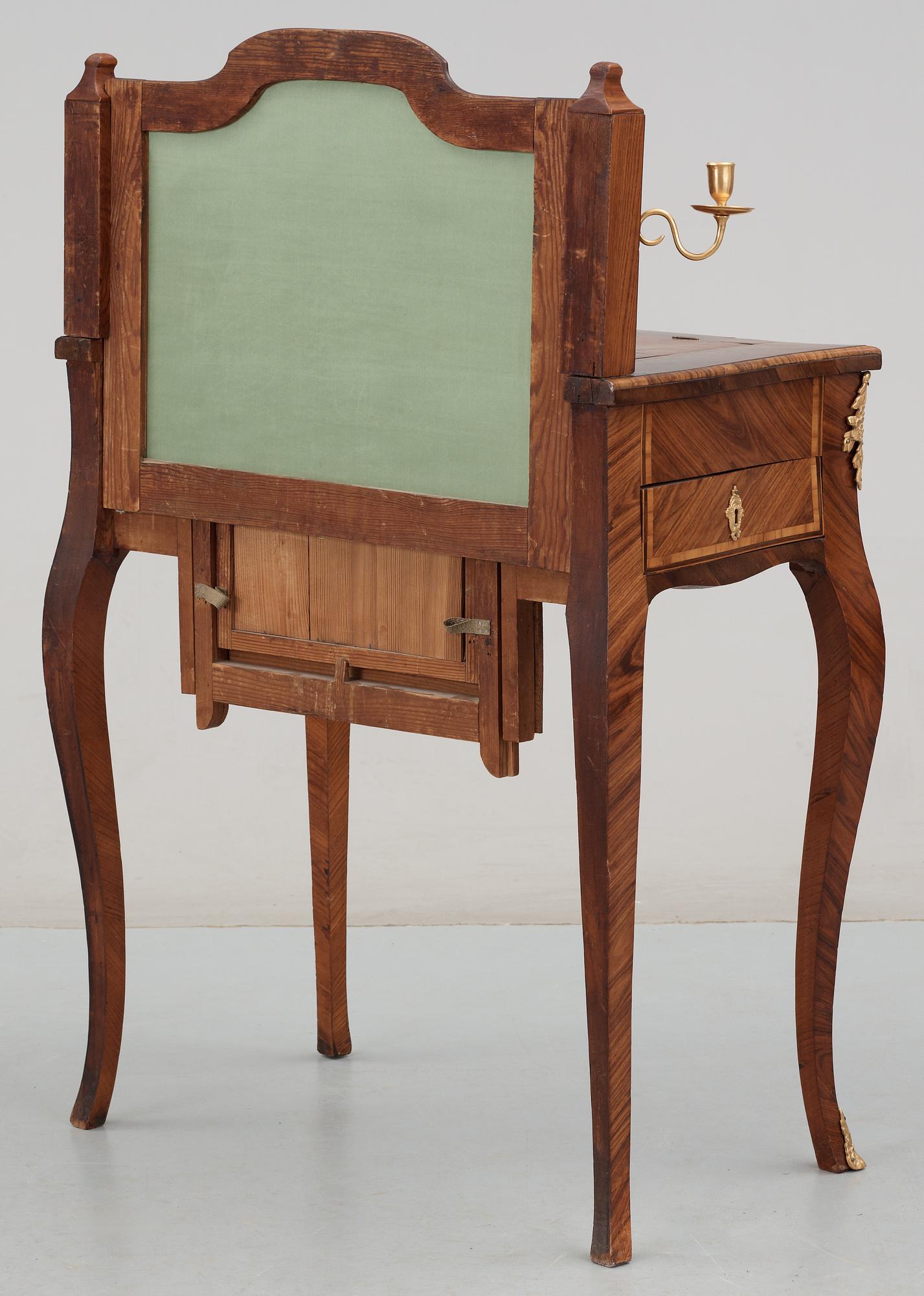 A Swedish Rococo 18th century dressing table in the manner of J. J. Eisenbletter.