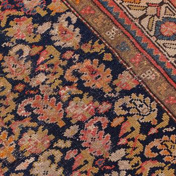 A semi-antique Malajir runner, around 245 x 95 cm.