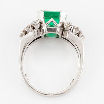A W.A. Bolin ring 18K white gold with an emerald-cut emerald and brilliant-cut diamonds.