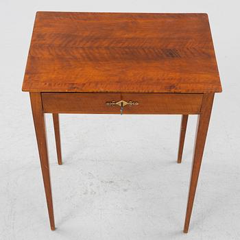 A Swedish Empire mahogany table, early 19th century.