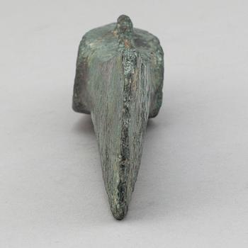 A bronze axe, 1500-500 B.C.