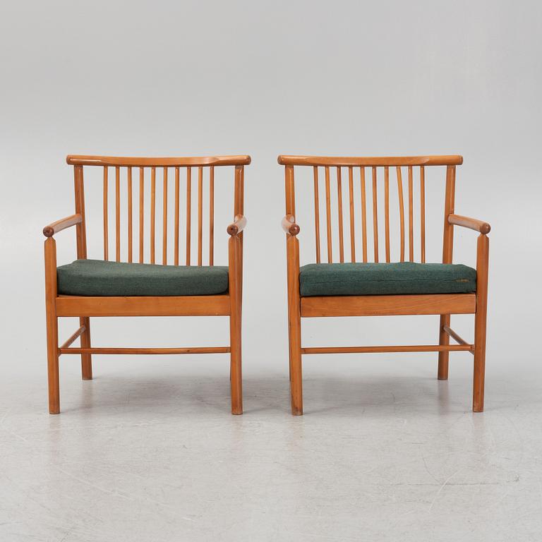 A pair of armchairs, mid 20th Century.