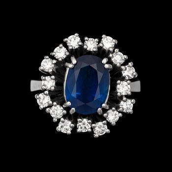 1081. RING, blå safir, 3.78 ct, med briljantslipade diamanter, tot. ca 1.23 ct.
