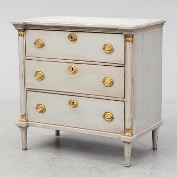 A mid 19th century painted chest of drawers.