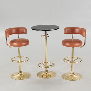 Two bar stools and a bar table by Börje Johanson, model "Jupiter", for Johanson design, second half of the 20th century.