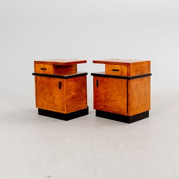 A pair of veneered masur birch bedside tables from the first half ot the 20th century.