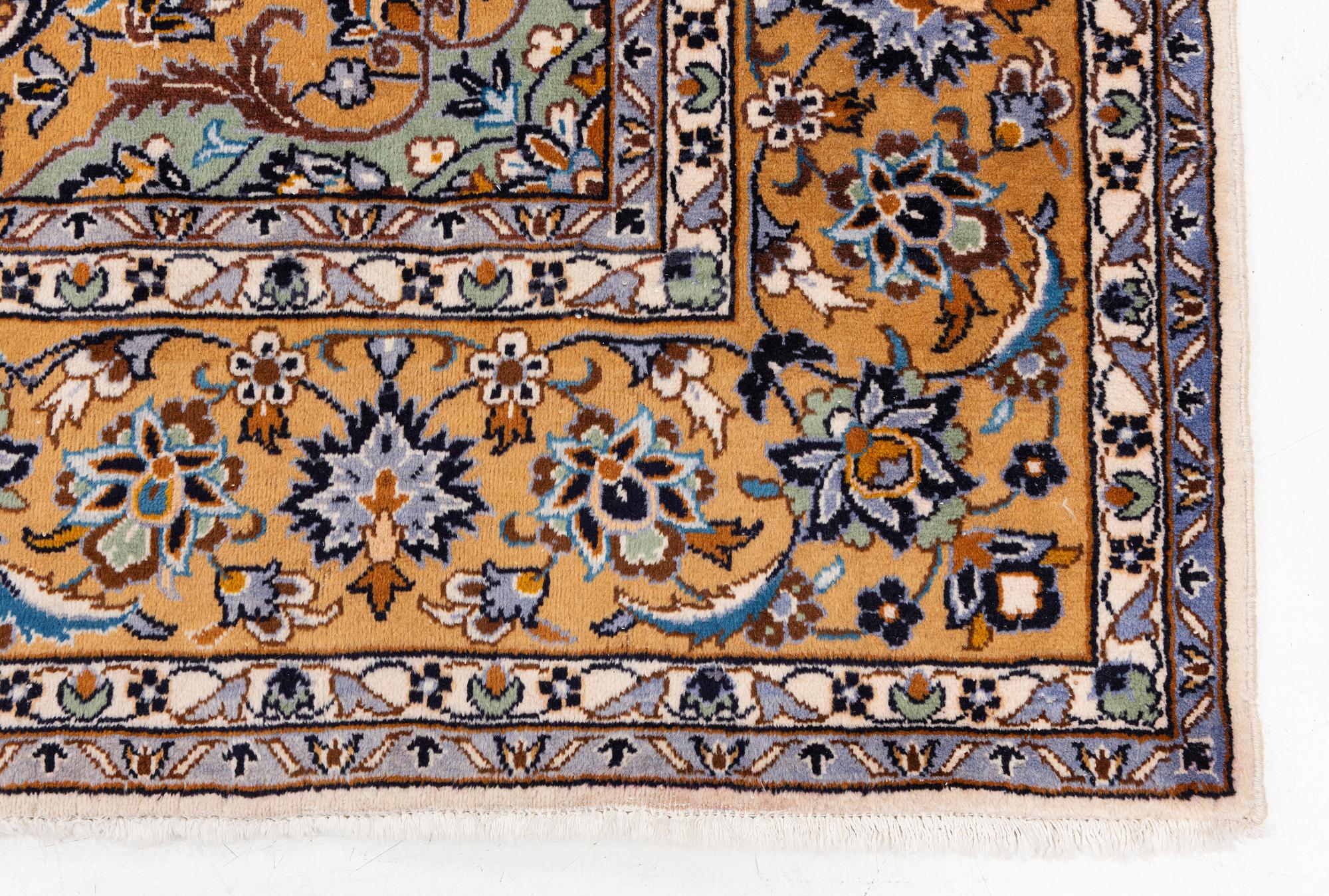 A Najafabad carpet, c. 350 x 237 cm.
