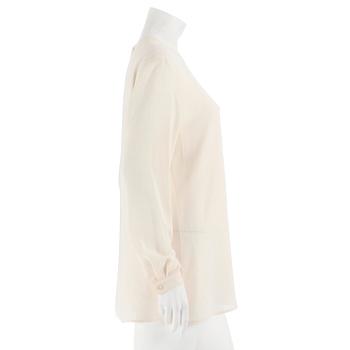 GIORGIO ARMANI, a créme colored silk blouse, size 42.