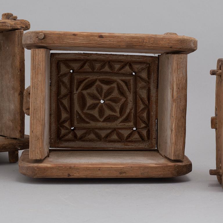 Four handcrafted wooden tins, 19th century.