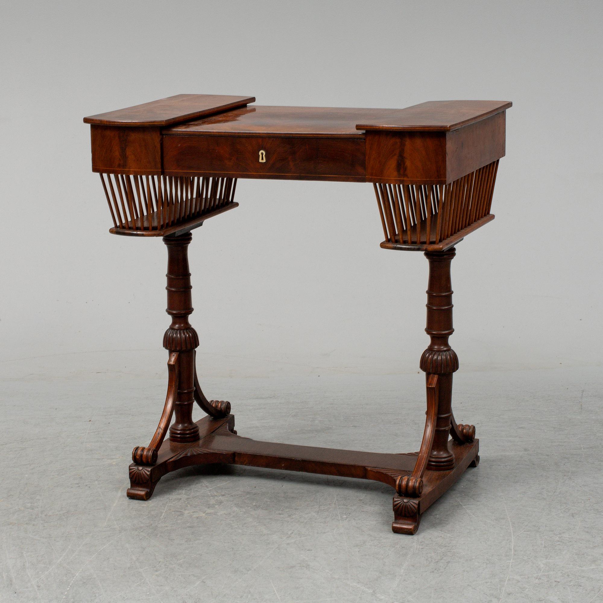 A sewing table, late Empire, 1830's.
