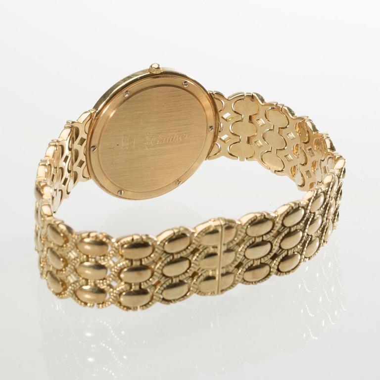 HERRARMBANDSUR, 18 k guld med briljantslipade diamanter, Gautier, Geneve. Vikt ca 132 g.