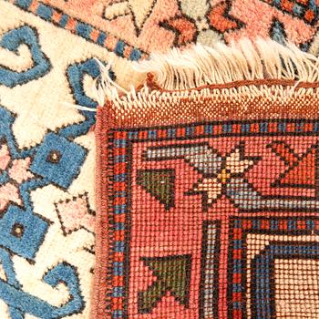 A semaintique Konya carpet ca 330x226 cm.