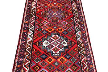 A Hamadan runner carpet, c. 385 x 86 cm.